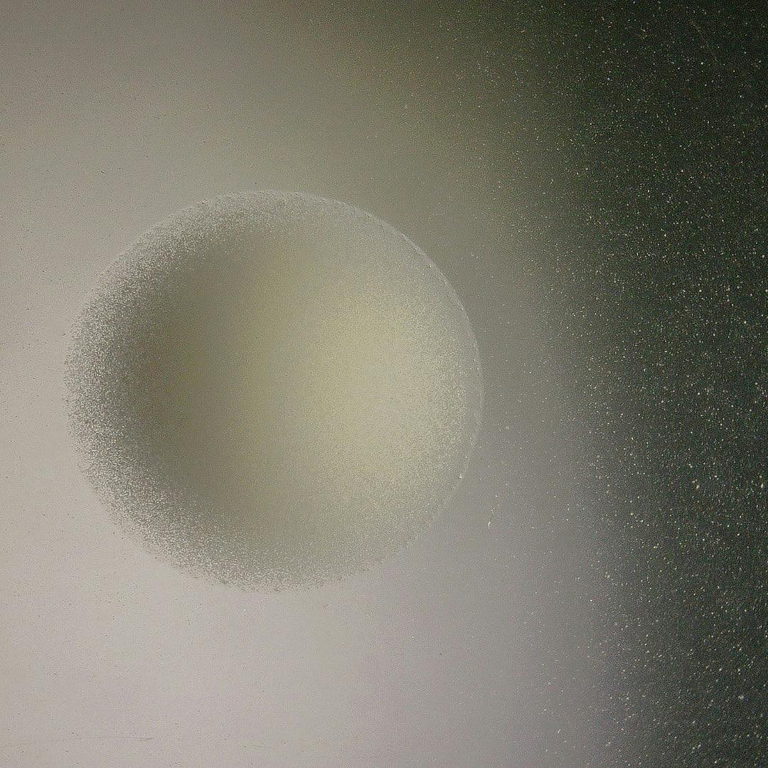 SUPRA-FADE serum droplet visualised under light microsopy.
